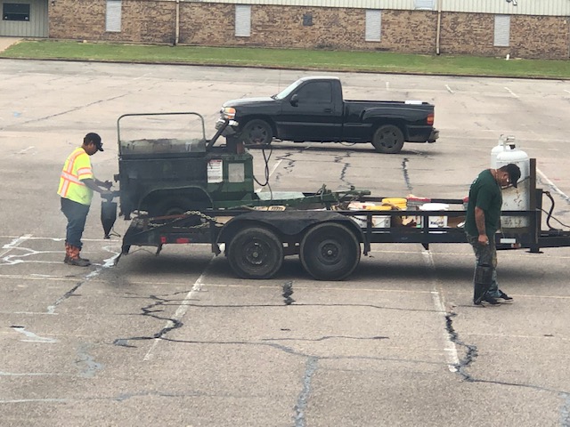 Rader Funeral Home parking lot before Pro-Pave sealcoating and striping